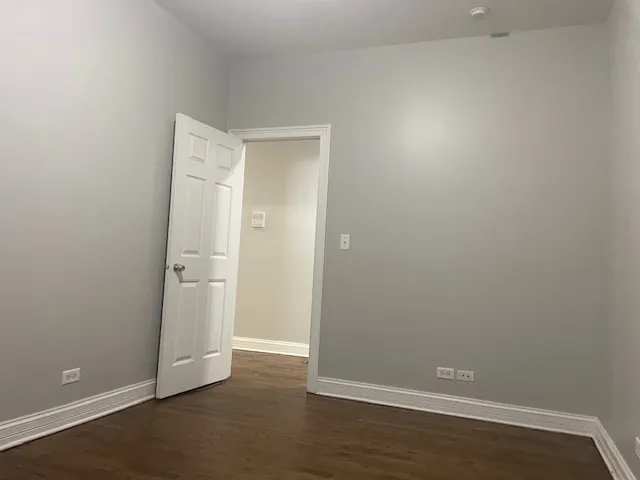 a bathroom with a toilet and a sink