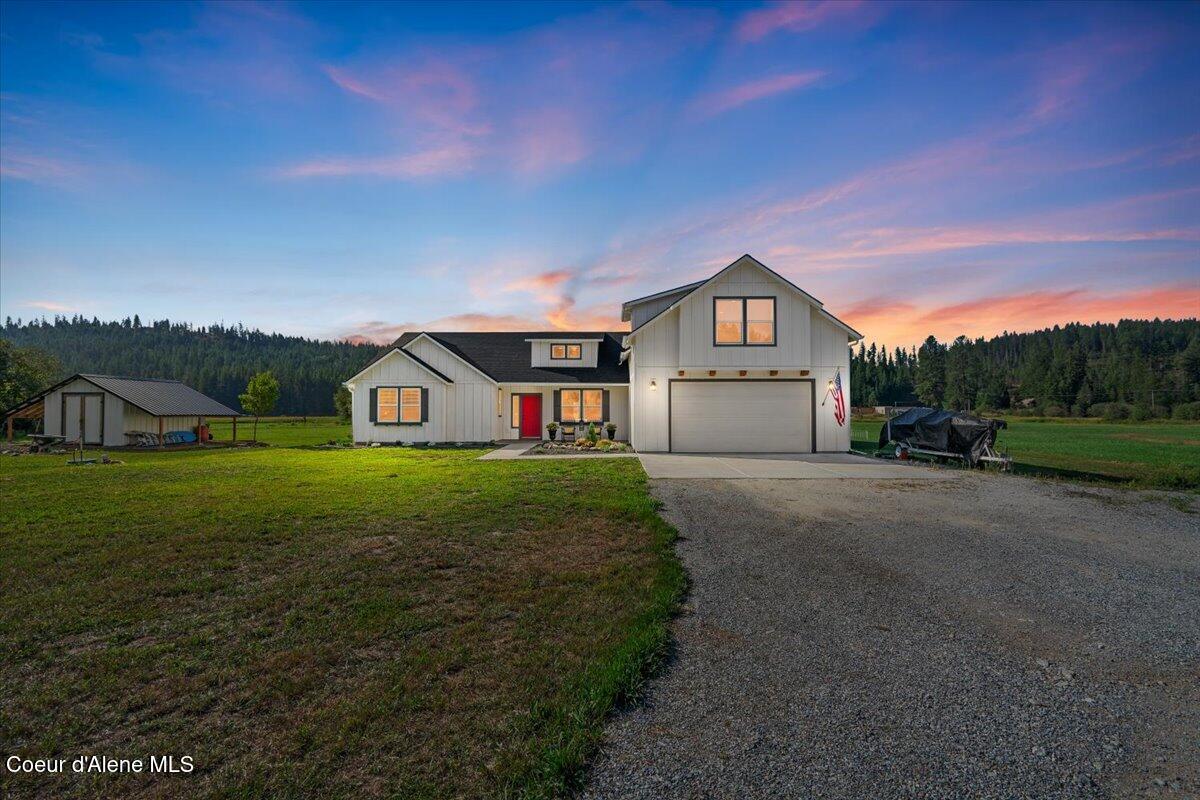 1974 Kelso Lake Road Athol, ID 83801 - Photo 5 of 55 01-Front of home twilight