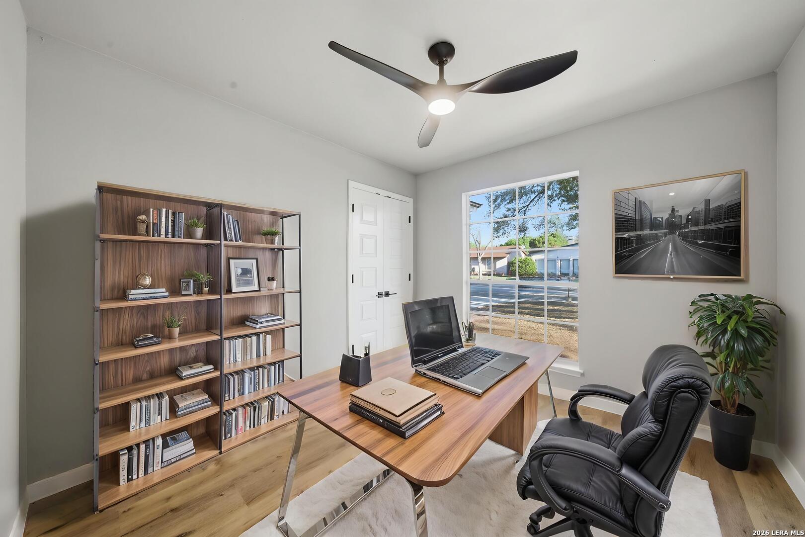 9446 Cliff Way Street San Antonio, TX 78250 - Photo 20 of 24 a view of a livingroom with workspace and a couch