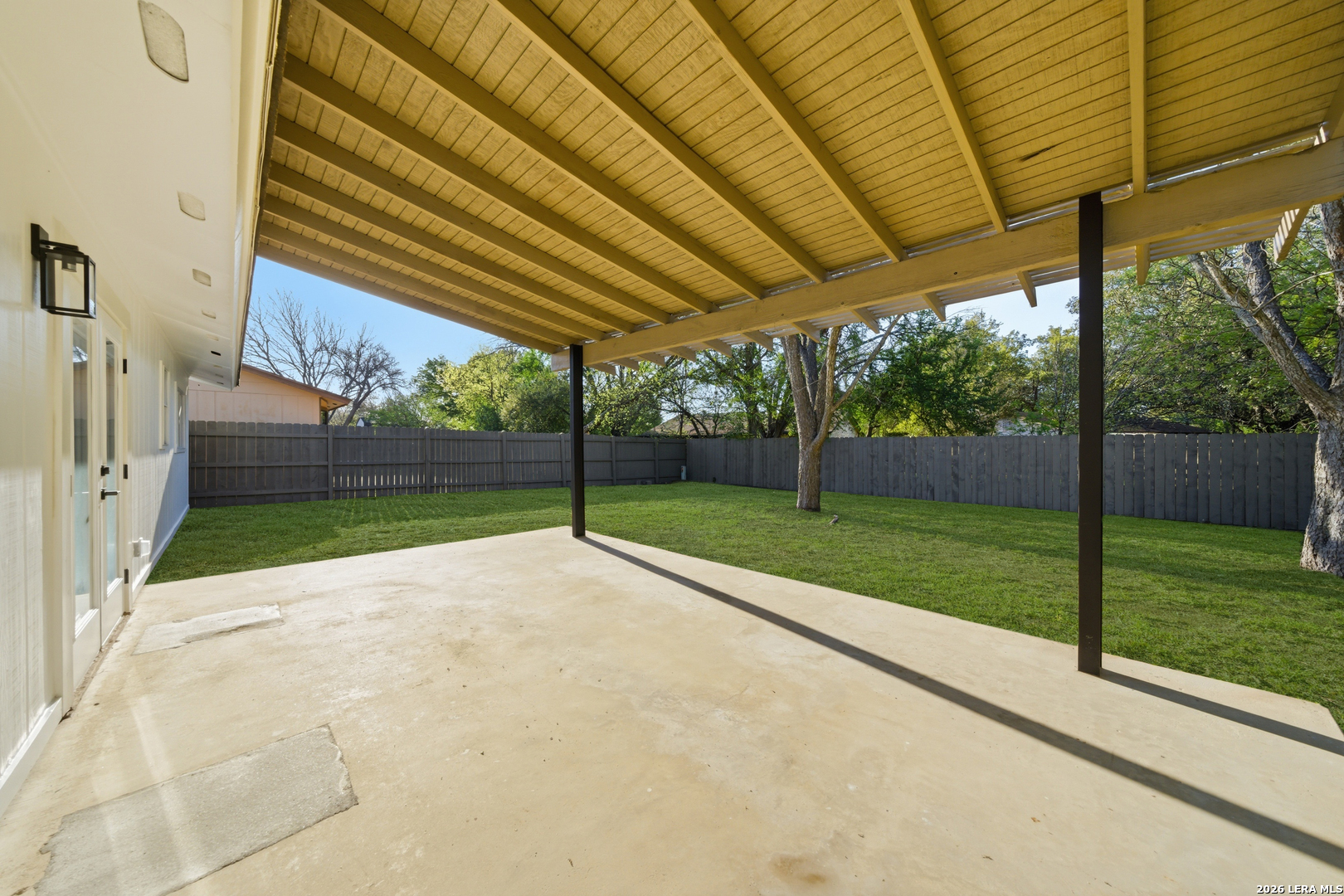 9446 Cliff Way Street San Antonio, TX 78250 - Photo 3 of 24 a view of a yard with porch