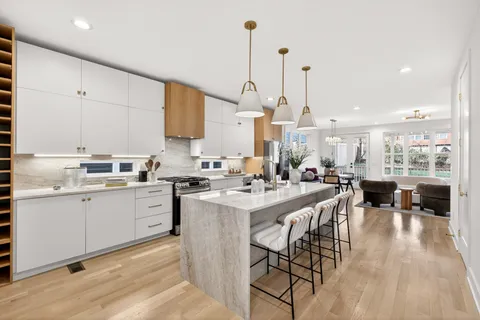 a large kitchen with lots of counter space and appliances