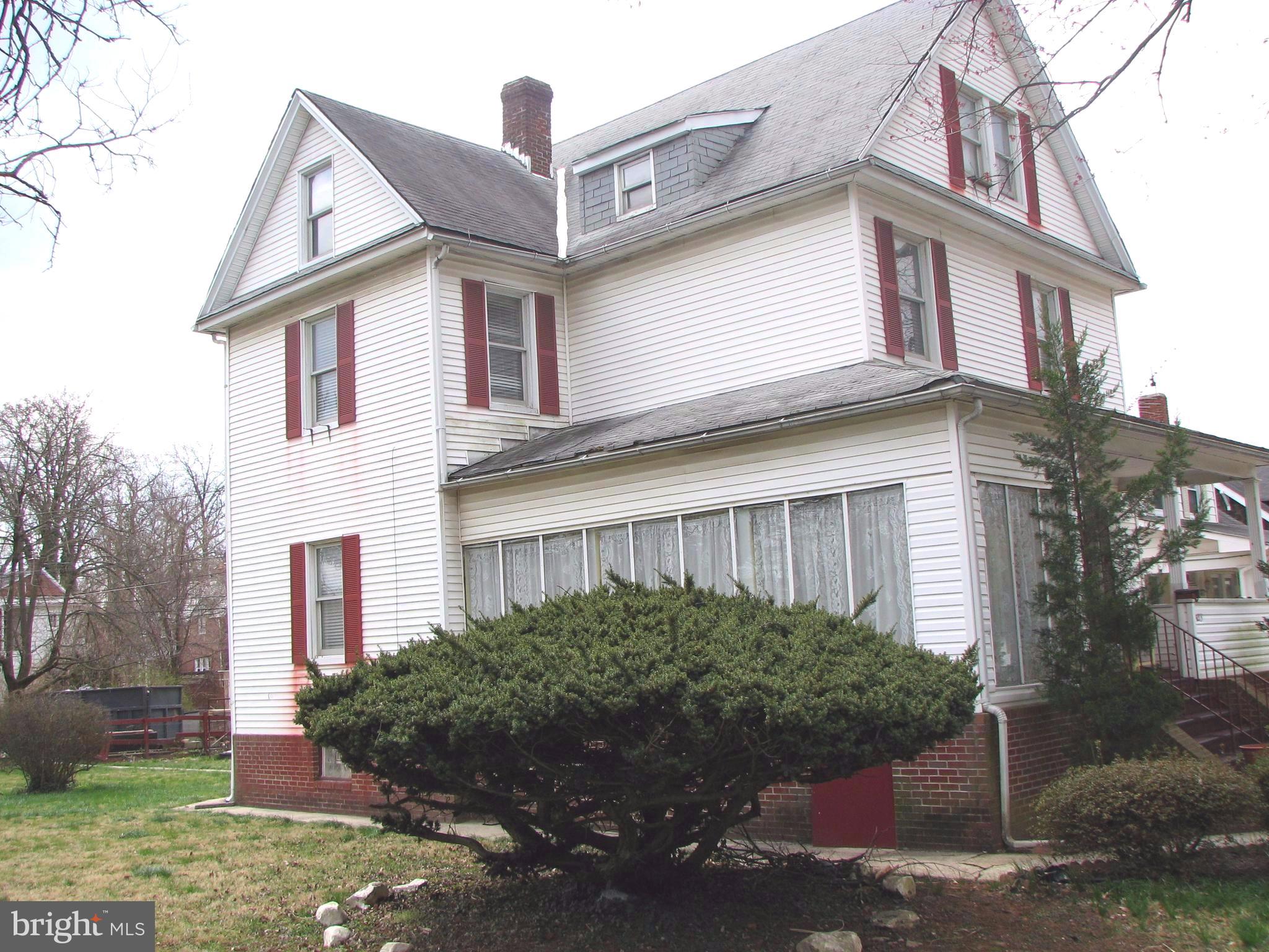 4213 Ridgewood Avenue Baltimore, MD 21215 - Photo 2 of 23 Side view and sun porch