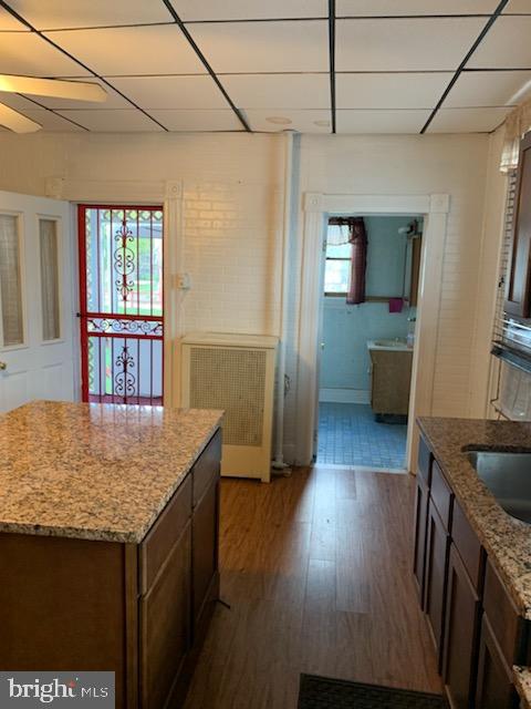 4213 Ridgewood Avenue Baltimore, MD 21215 - Photo 11 of 23 Powder room access from kitchen