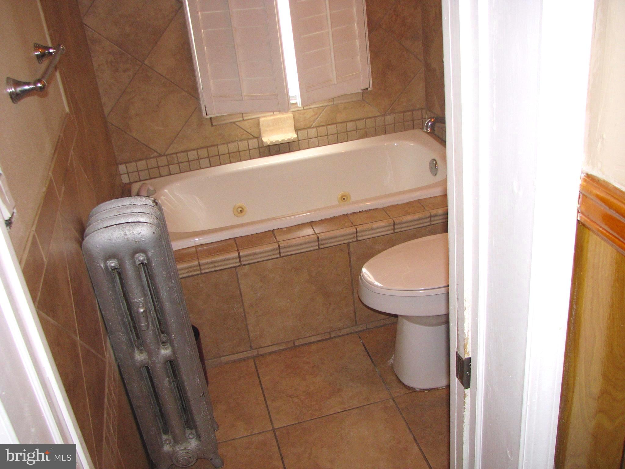 4213 Ridgewood Avenue Baltimore, MD 21215 - Photo 13 of 23 upper level bath