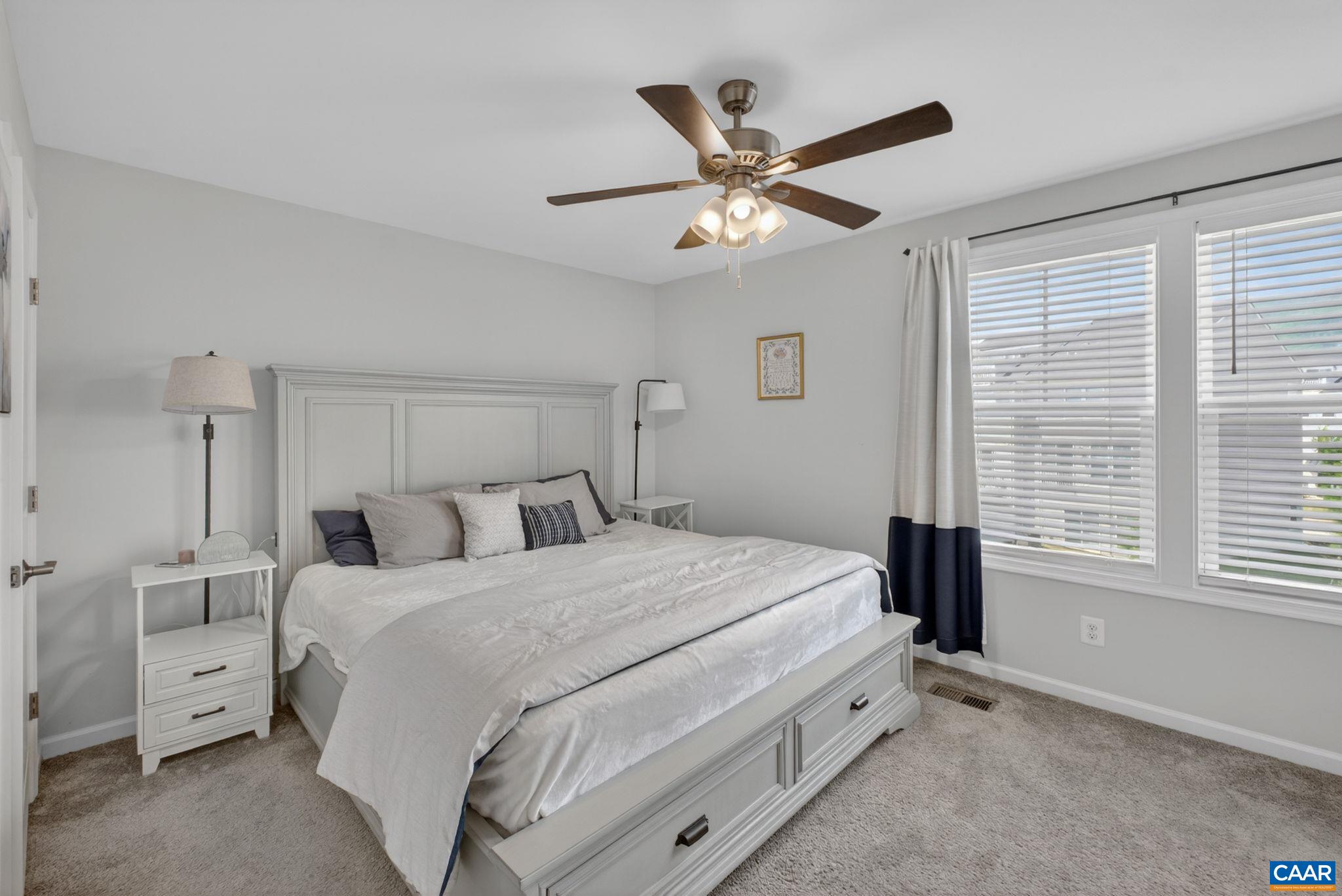 4418 Alston Street Crozet, VA 22932 - Photo 15 of 41 a bedroom with a large bed and a window