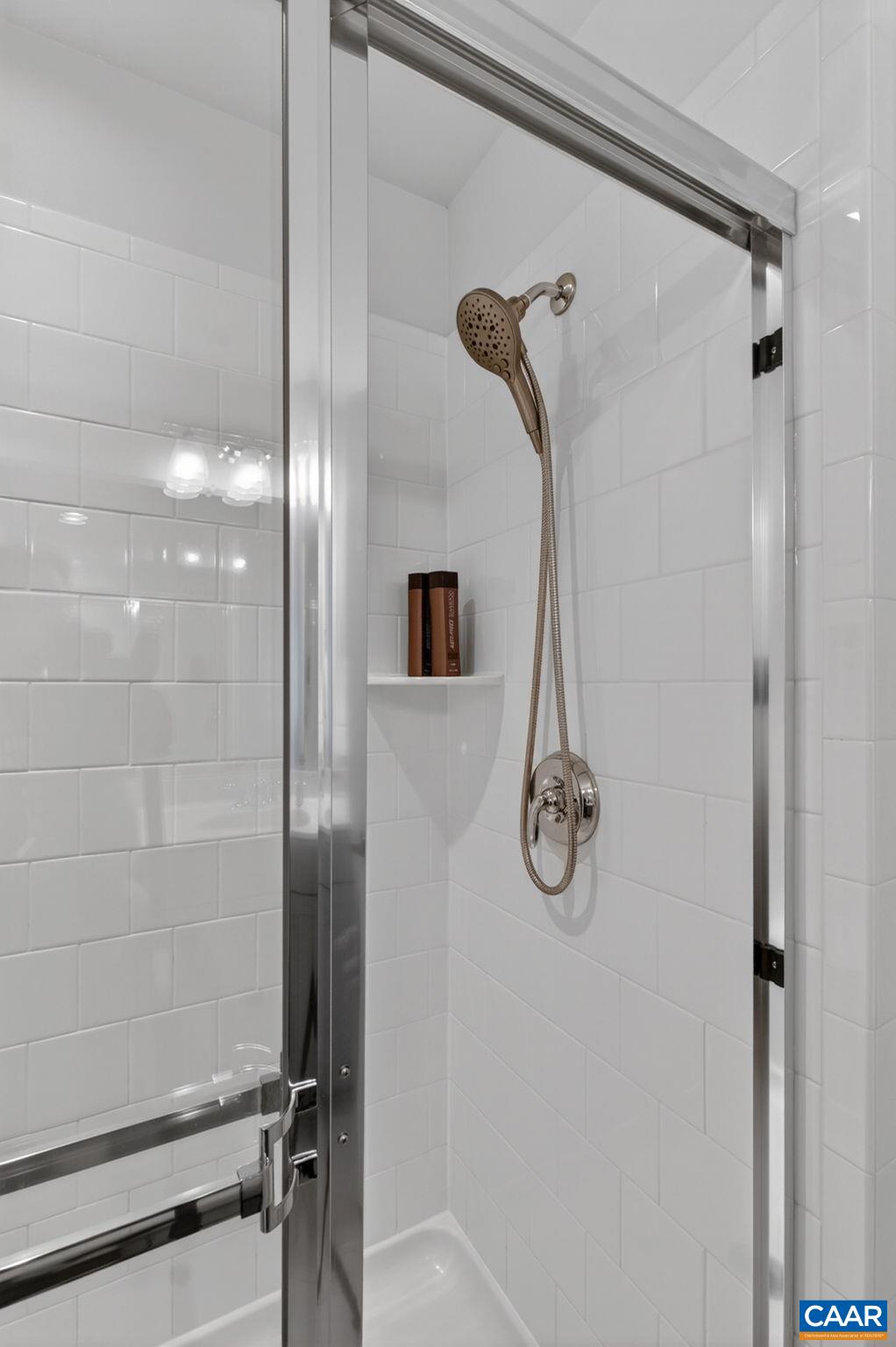 4418 Alston Street Crozet, VA 22932 - Photo 18 of 41 a bathroom with a shower and tub