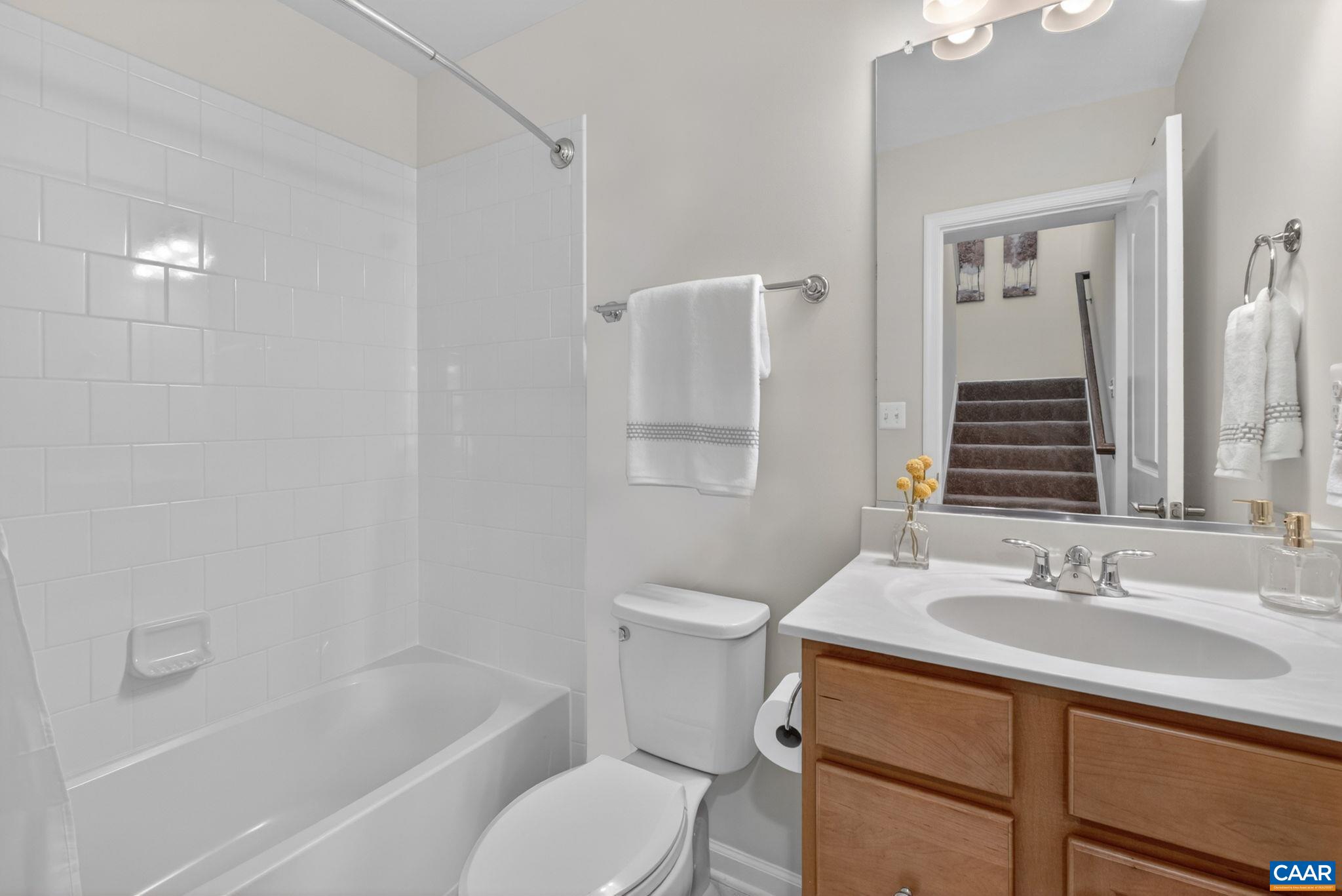 4418 Alston Street Crozet, VA 22932 - Photo 21 of 41 a bathroom with a sink toilet and shower