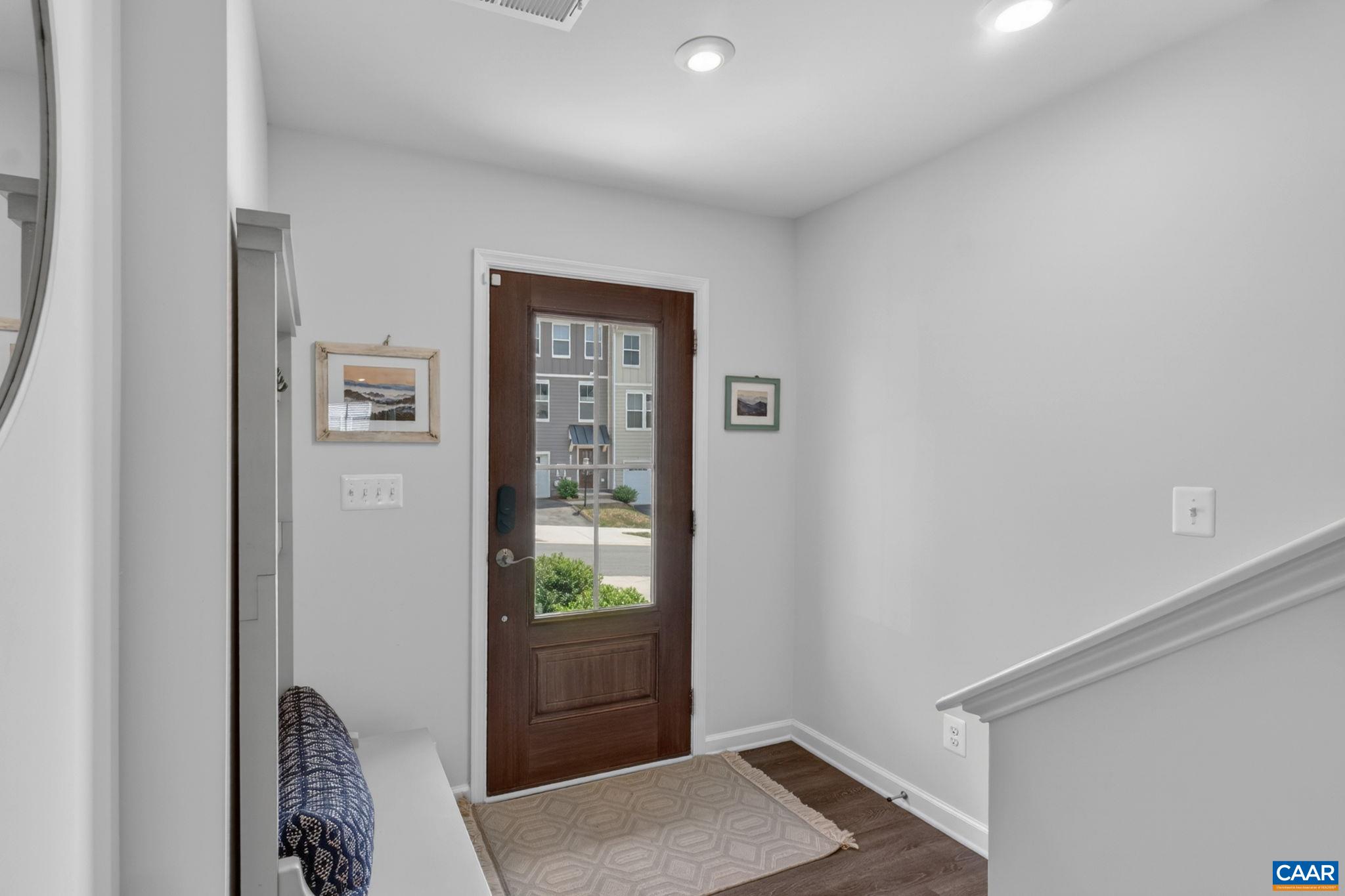 4418 Alston Street Crozet, VA 22932 - Photo 3 of 41 a view of hallway with furniture and a gate