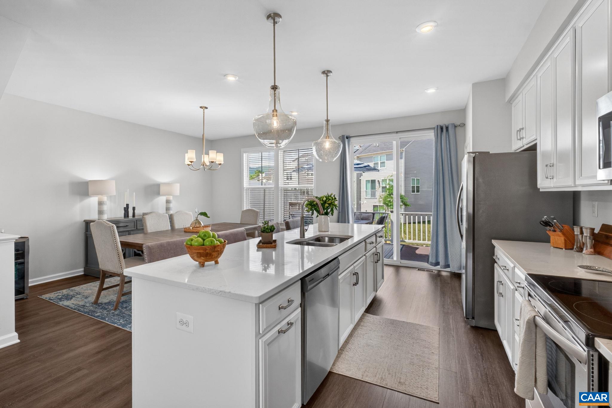 4418 Alston Street Crozet, VA 22932 - Photo 6 of 41 a kitchen with counter top space a sink appliances and wooden floor