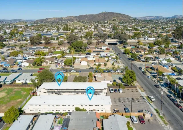 an aerial view of a city with lots of residential buildings