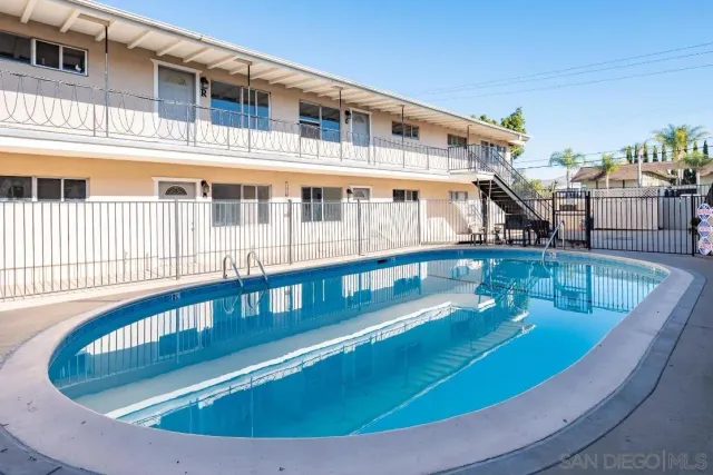a view of a house with swimming pool