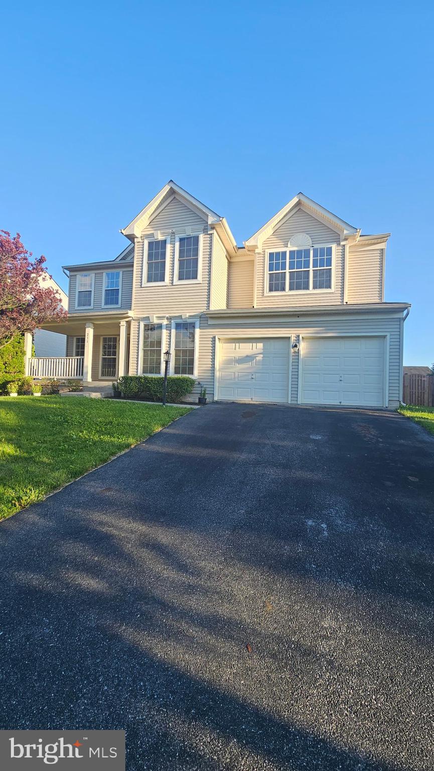 233 MacKenzie Lane Stephenson, VA 22656 - Photo 1 of 54 a front view of a house with a yard