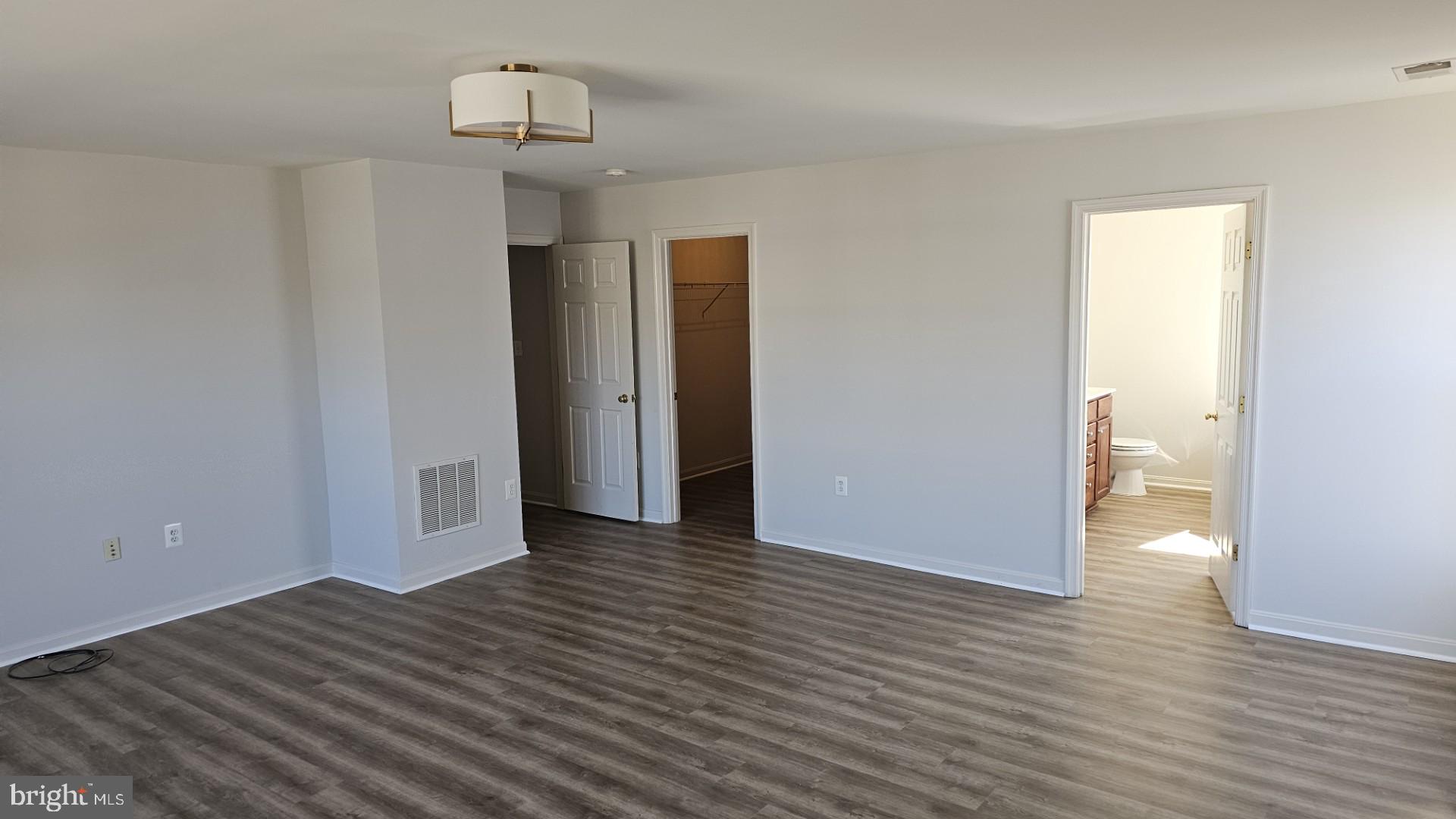 233 MacKenzie Lane Stephenson, VA 22656 - Photo 11 of 54 a view of a room with wooden floor