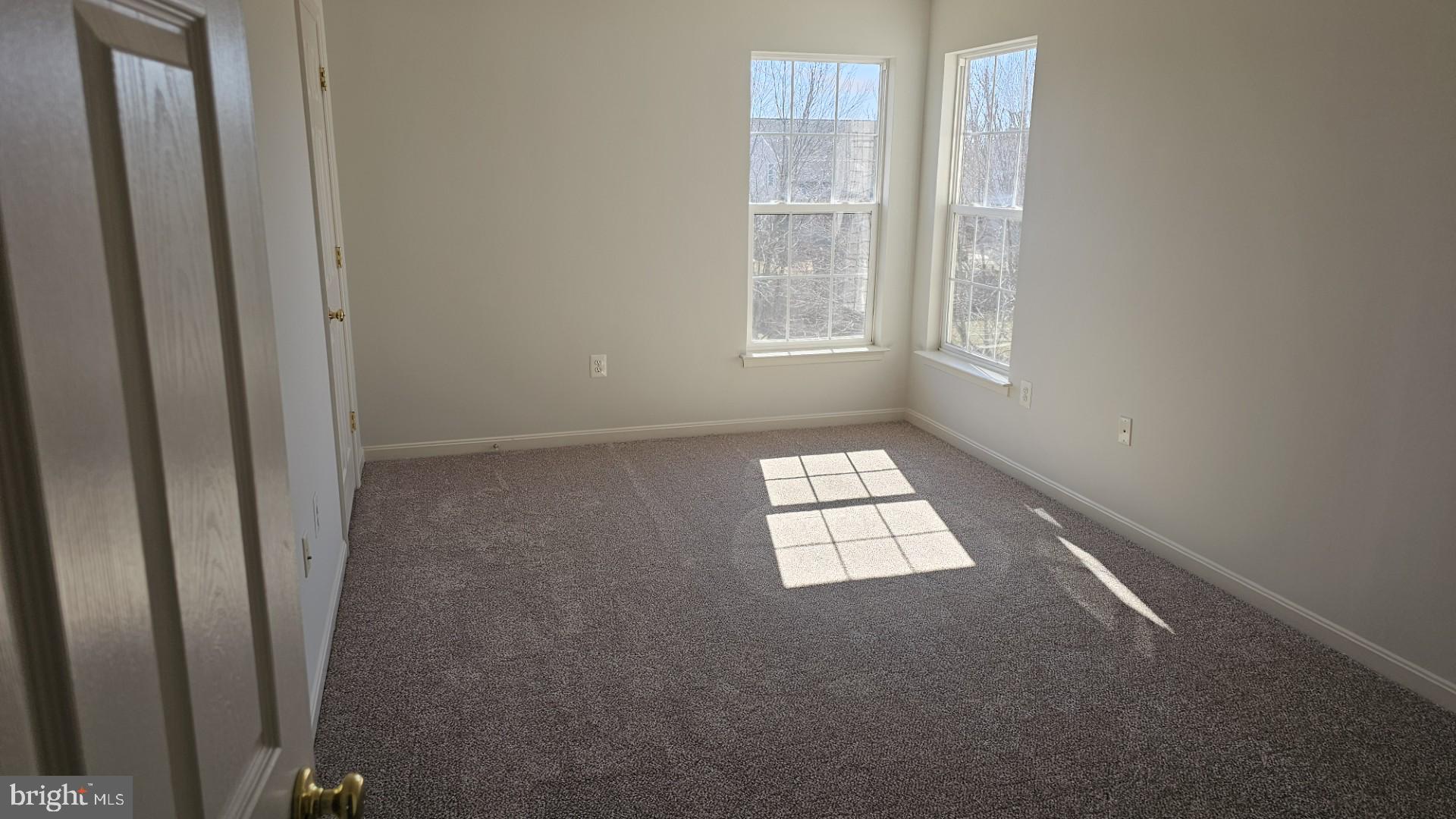 233 MacKenzie Lane Stephenson, VA 22656 - Photo 18 of 54 an empty room with windows