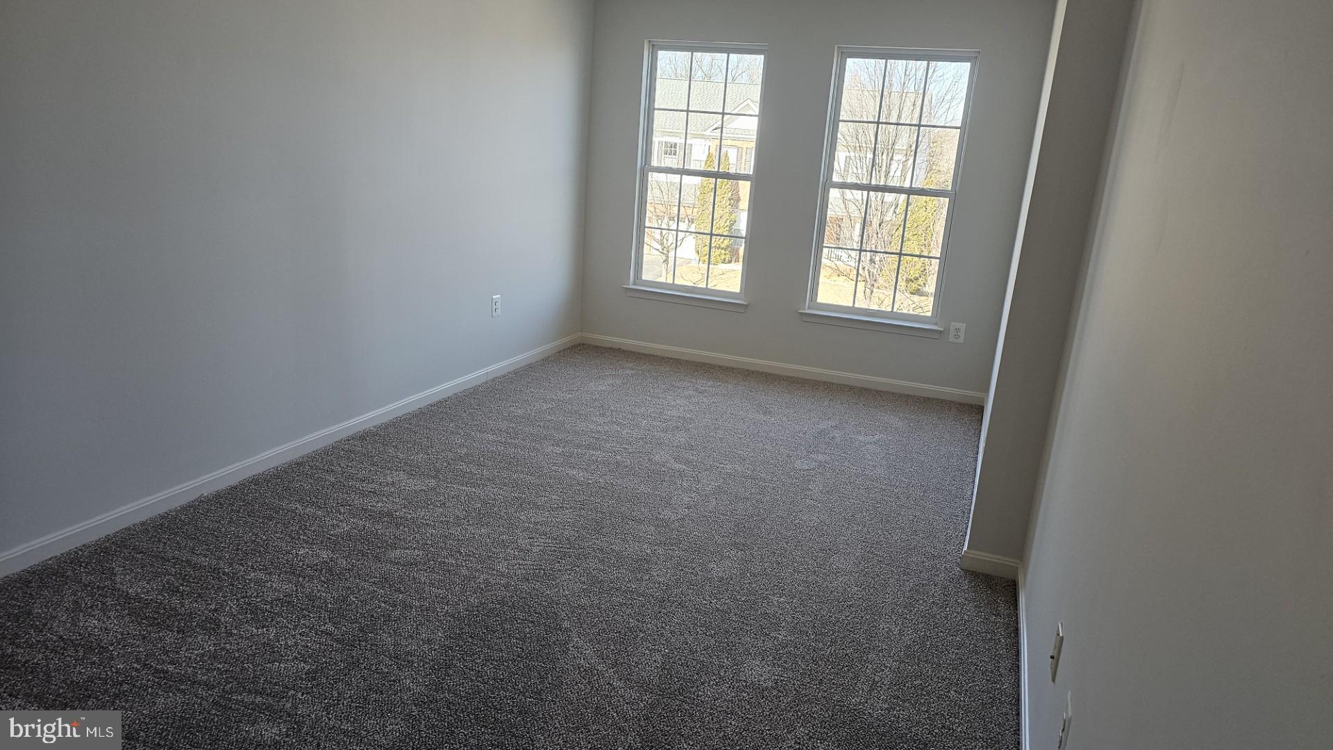 233 MacKenzie Lane Stephenson, VA 22656 - Photo 19 of 54 an empty room with windows