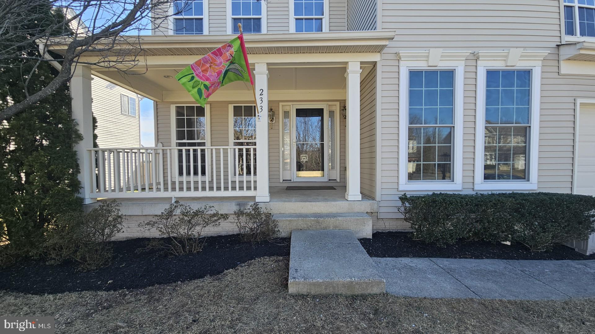 233 MacKenzie Lane Stephenson, VA 22656 - Photo 2 of 54 a front view of a house with a yard