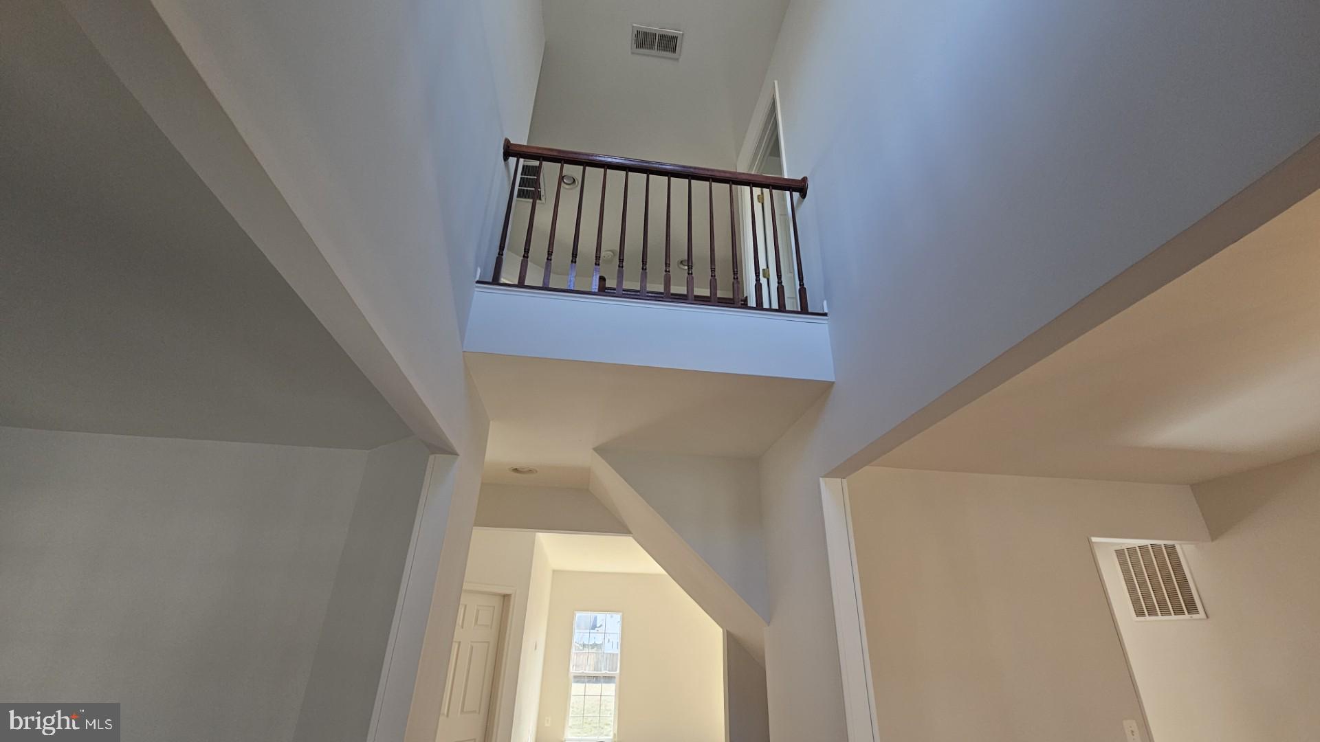 233 MacKenzie Lane Stephenson, VA 22656 - Photo 25 of 54 a view of a hallway with stairs