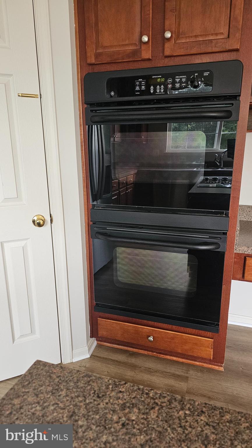 233 MacKenzie Lane Stephenson, VA 22656 - Photo 35 of 54 a stove top oven sitting inside of a kitchen