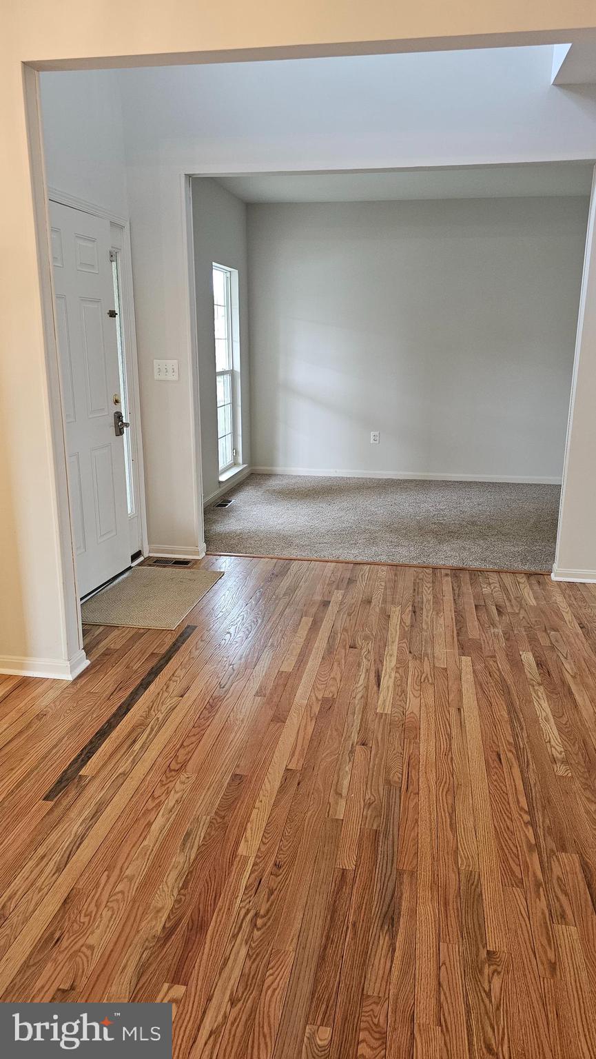 233 MacKenzie Lane Stephenson, VA 22656 - Photo 37 of 54 a view of wooden floor and brick walls