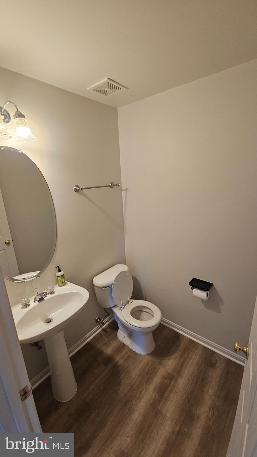 233 MacKenzie Lane Stephenson, VA 22656 - Photo 39 of 54 a bathroom with a sink toilet and a mirror