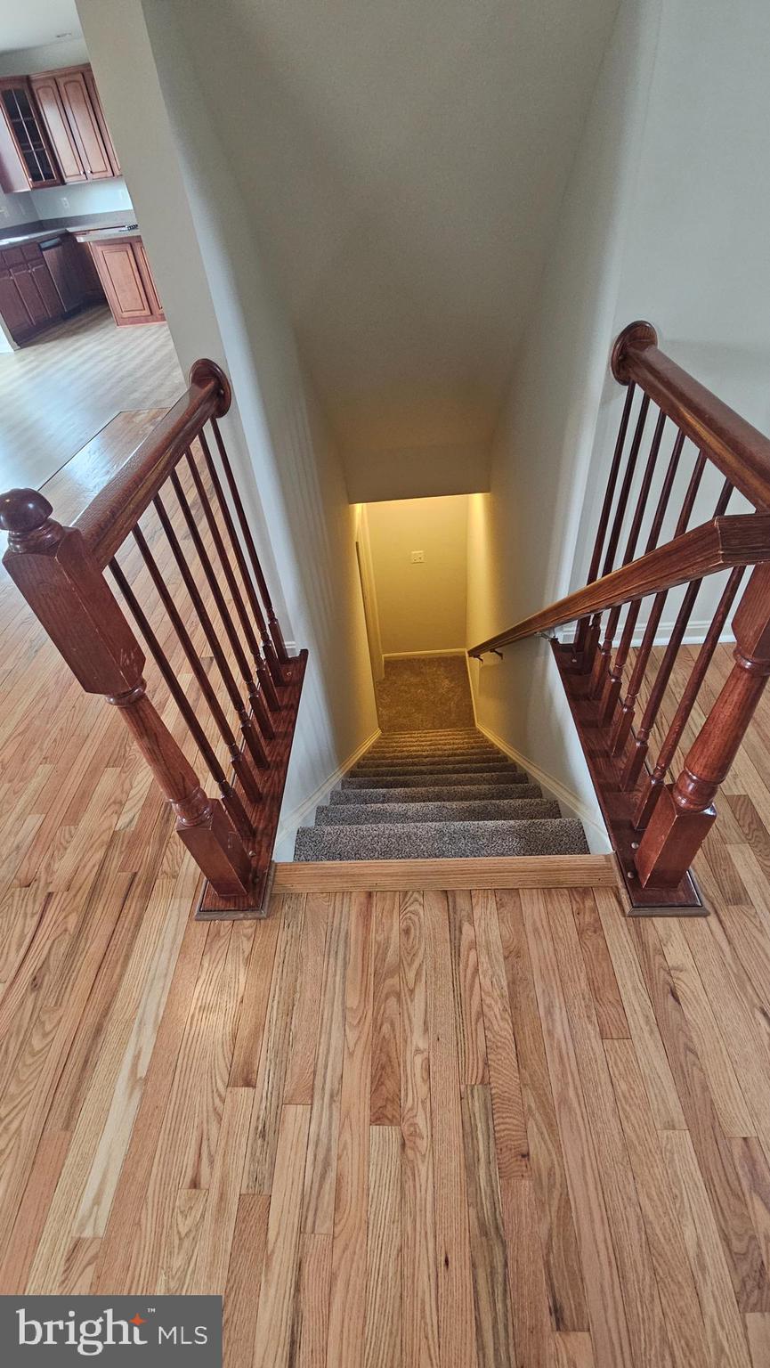 233 MacKenzie Lane Stephenson, VA 22656 - Photo 42 of 54 a view of an empty room with wooden floor