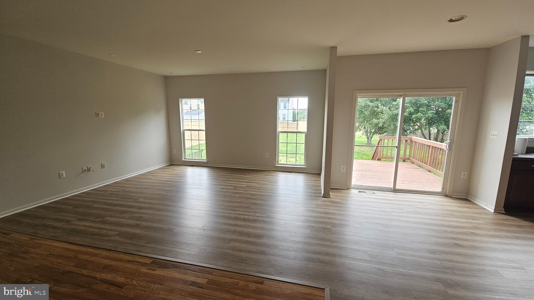 233 MacKenzie Lane Stephenson, VA 22656 - Photo 45 of 54 a view of an empty room with wooden floor and a window