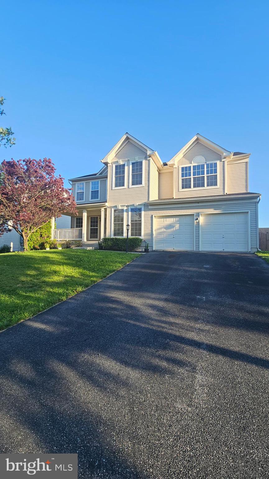 233 MacKenzie Lane Stephenson, VA 22656 - Photo 53 of 54 a front view of a house with a yard