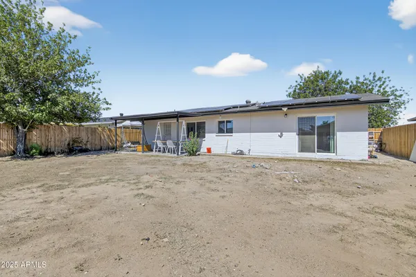 a view of garage and yard