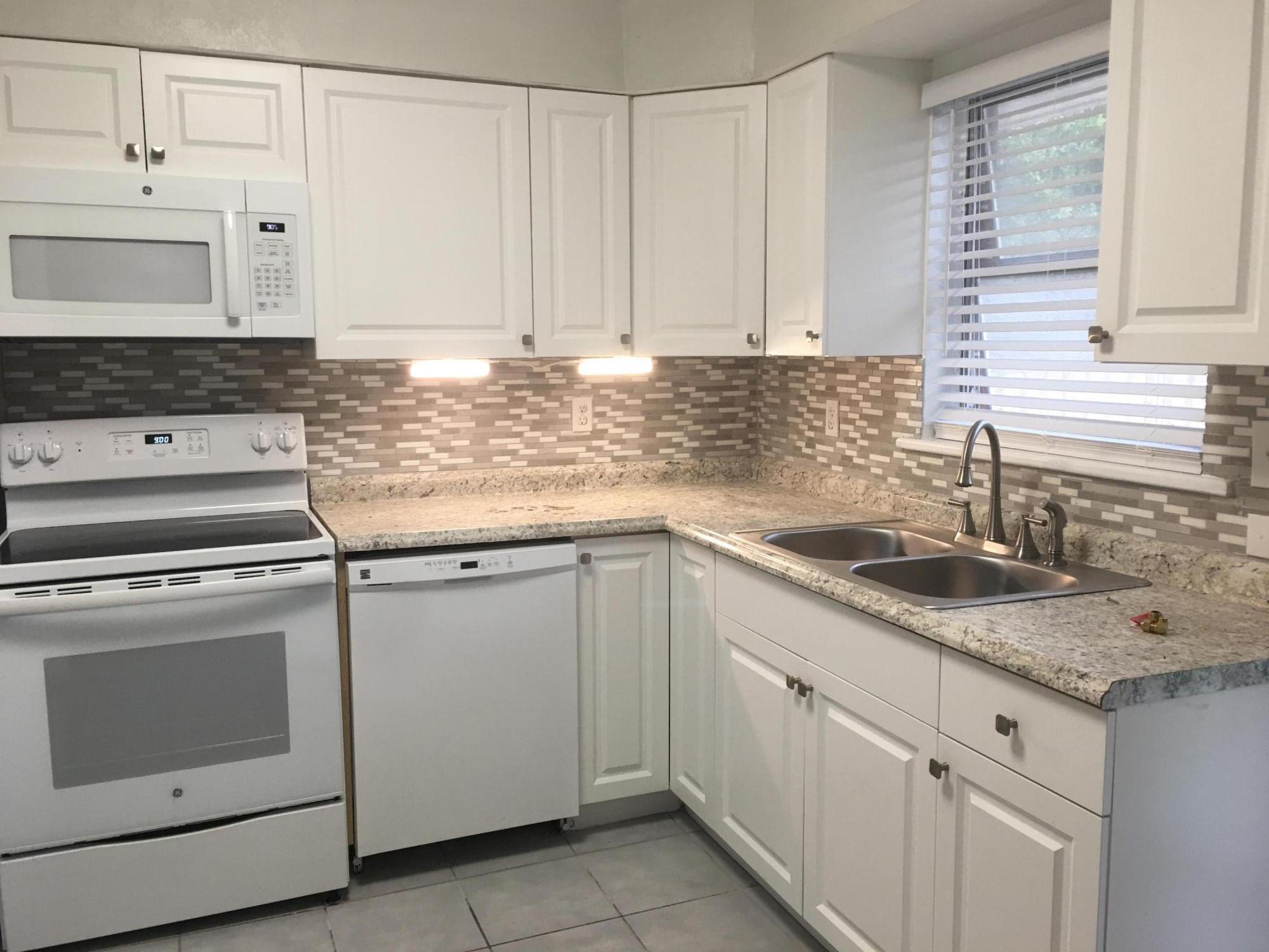3550 Kirk Road Palm Springs, FL 33461 - Photo 1 of 32 New Kitchen - Main House