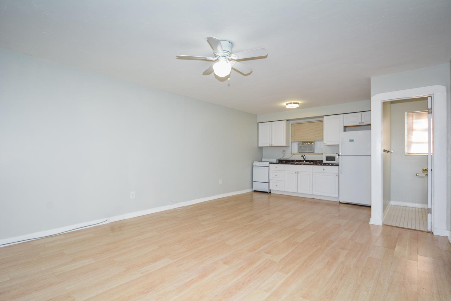3550 Kirk Road Palm Springs, FL 33461 - Photo 25 of 32 Living Room & Kitchen