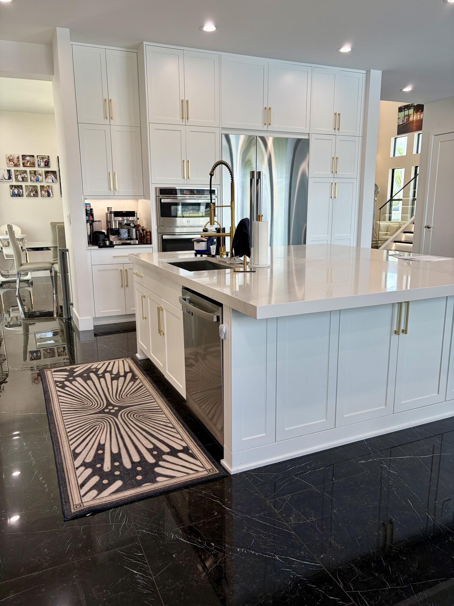 8573 Crystal Downs Avenue Boca Raton, FL 33434 - Photo 19 of 82 a kitchen with stainless steel appliances granite countertop a refrigerator sink and cabinets