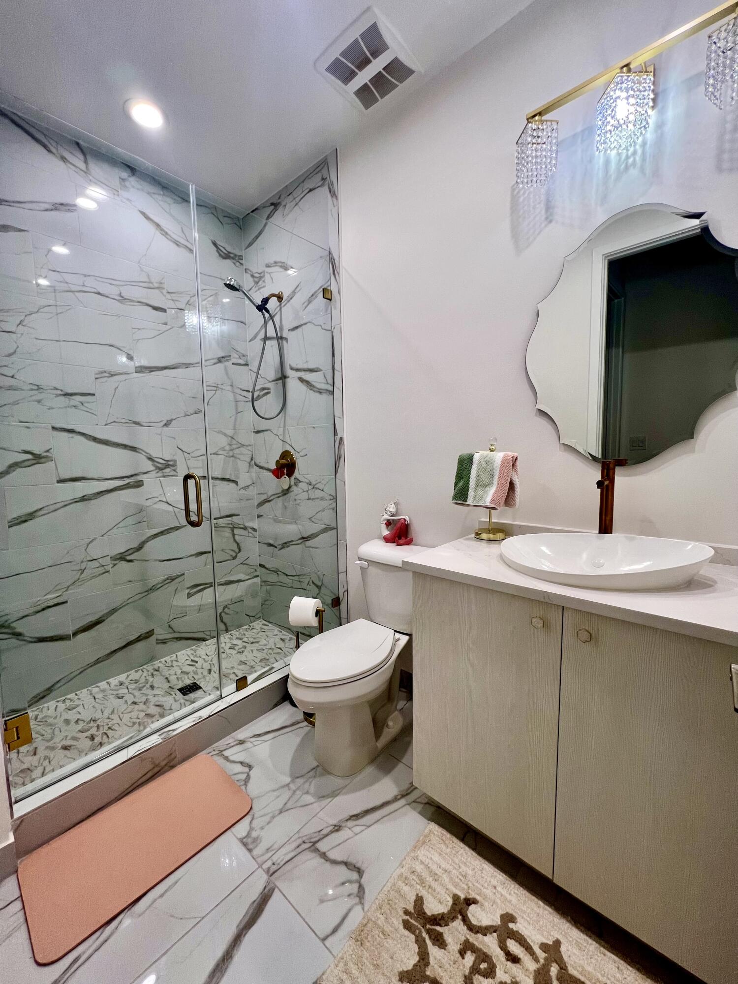 8573 Crystal Downs Avenue Boca Raton, FL 33434 - Photo 37 of 82 a bathroom with a sink toilet and shower