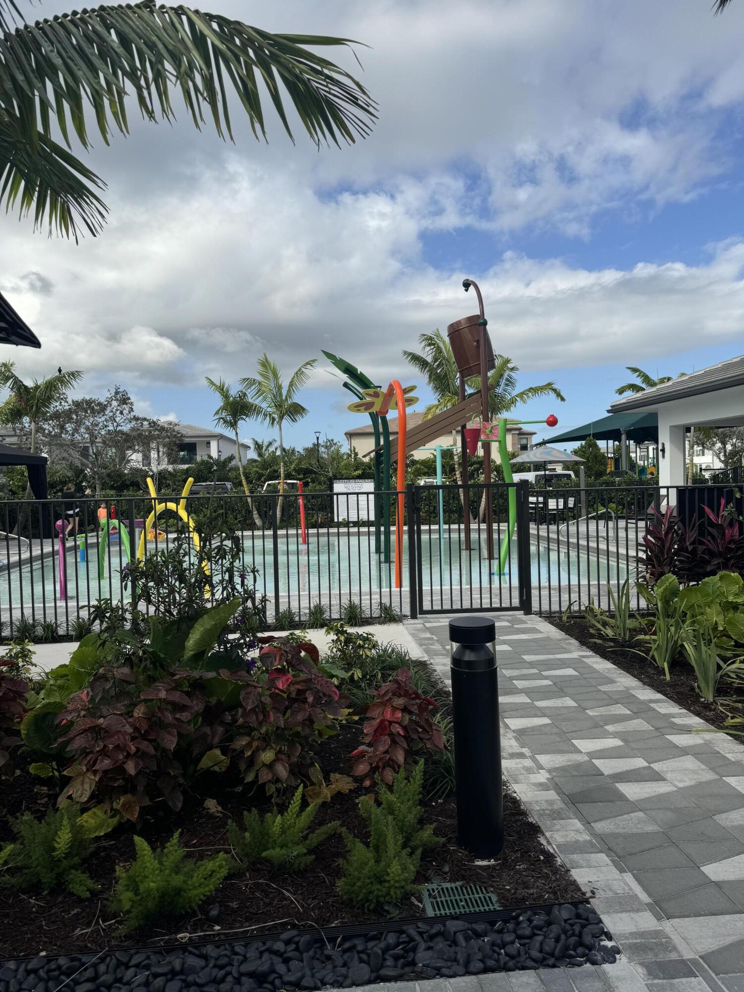 8573 Crystal Downs Avenue Boca Raton, FL 33434 - Photo 72 of 82 a view of a garden with a pathway
