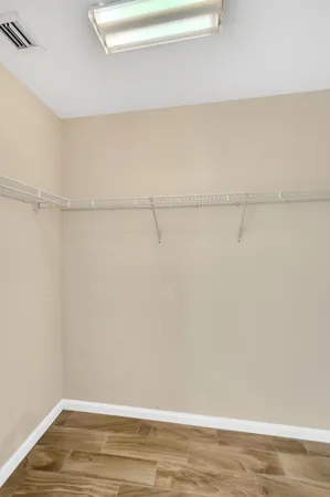 a view of small space with racks on the wall