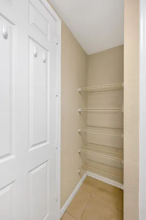 a view of an empty walk in closet