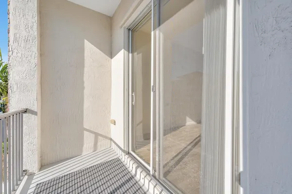 a view of a bathroom from a balcony