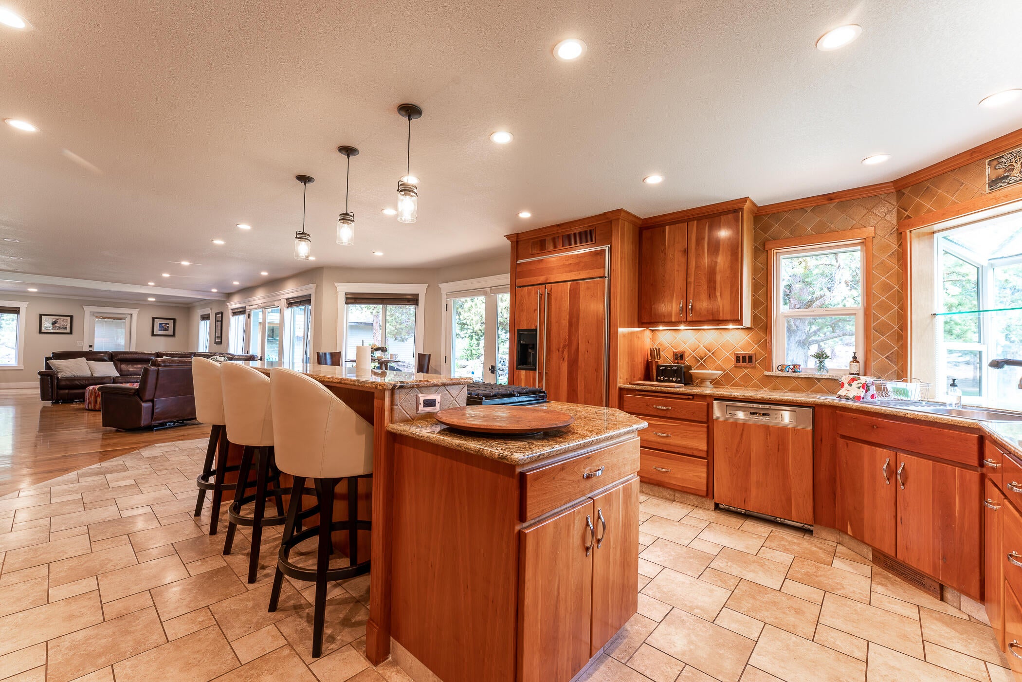 64300 Crosswinds Road Bend, OR 97703 - Photo 18 of 61 Views from the kitchen, eating area, living room, wet bar, and game room.