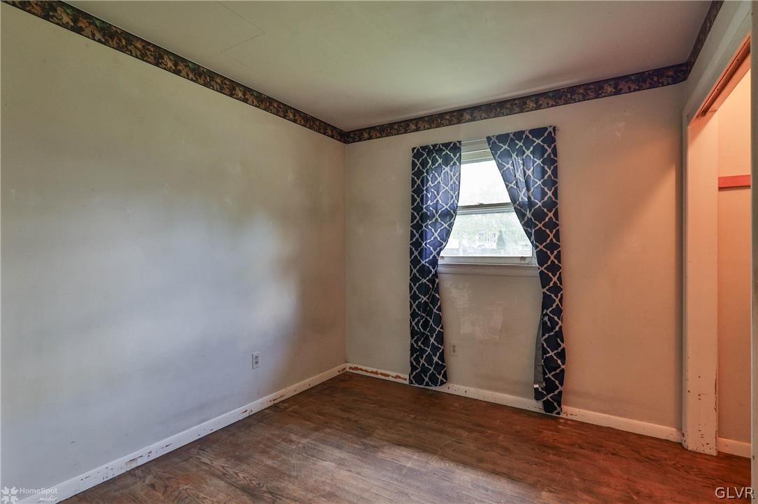 1034 Pine Tree Drive Slatington, PA 18080 - Photo 16 of 46 an empty room with windows