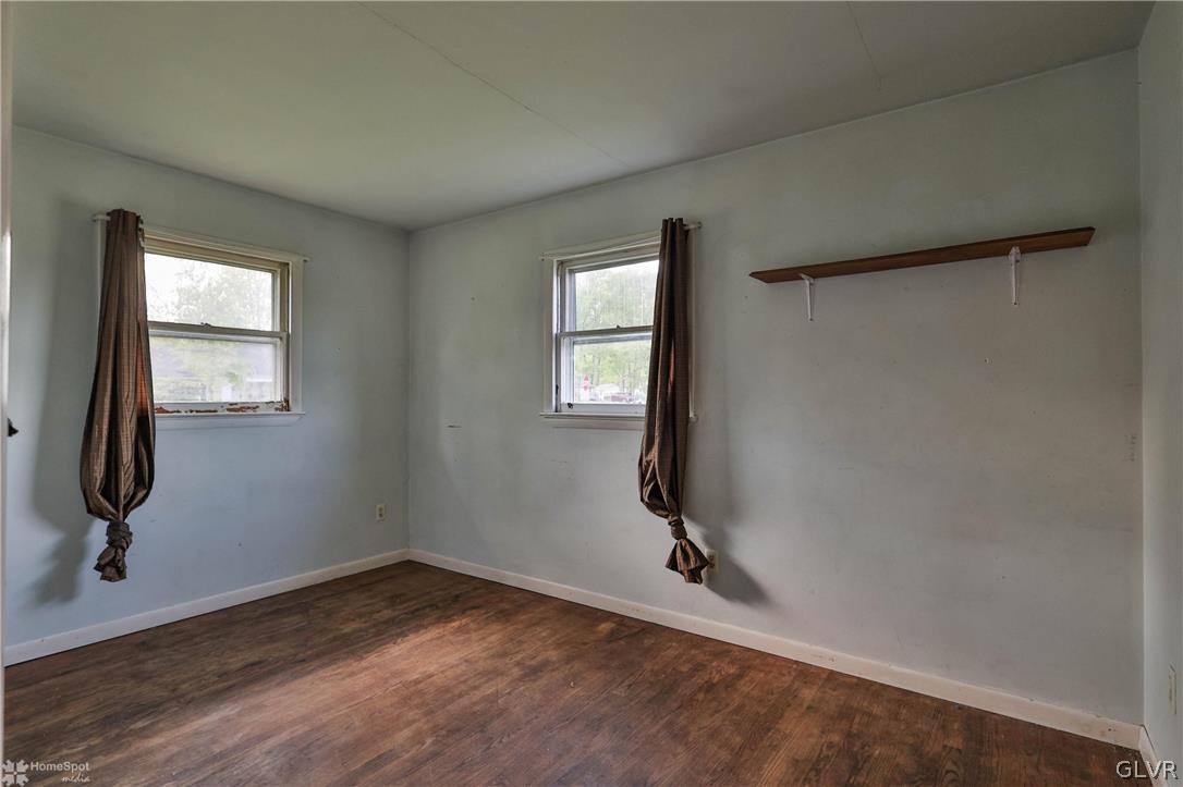 1034 Pine Tree Drive Slatington, PA 18080 - Photo 19 of 46 an empty room with a door