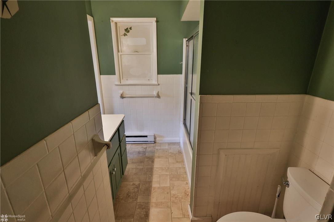 1034 Pine Tree Drive Slatington, PA 18080 - Photo 25 of 46 a bathroom with a toilet and a shower