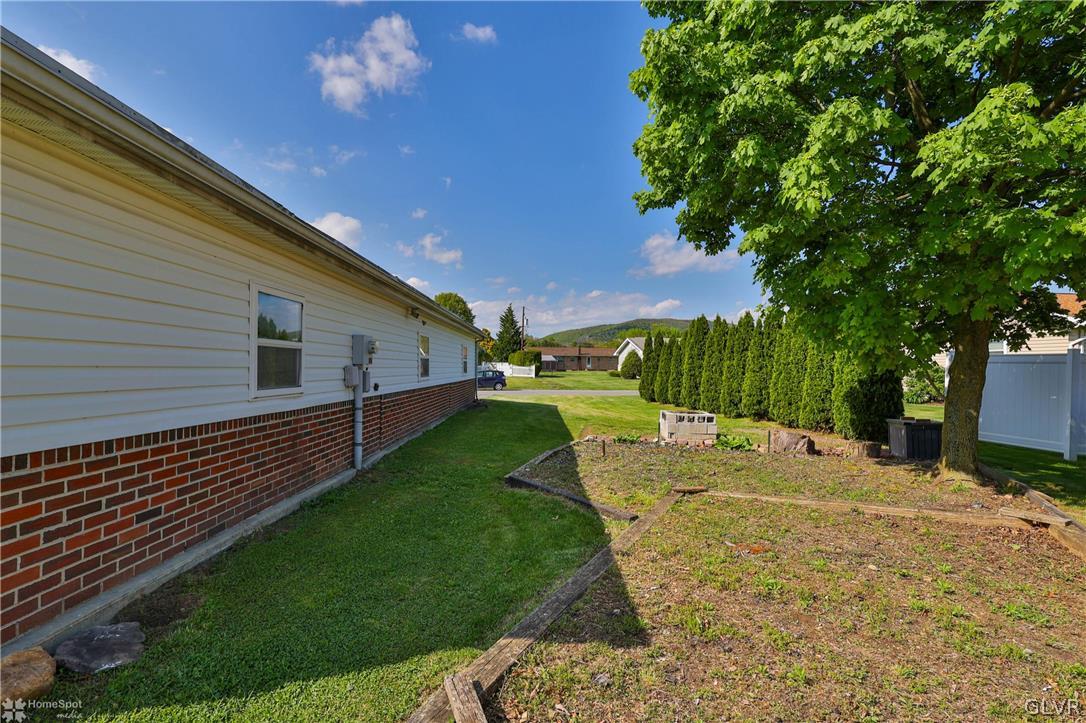 1034 Pine Tree Drive Slatington, PA 18080 - Photo 36 of 46 a view of a backyard of the house