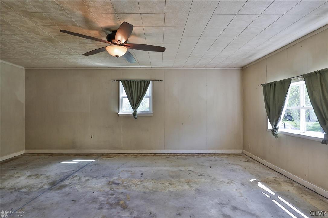 1034 Pine Tree Drive Slatington, PA 18080 - Photo 8 of 46 a view of empty room with window