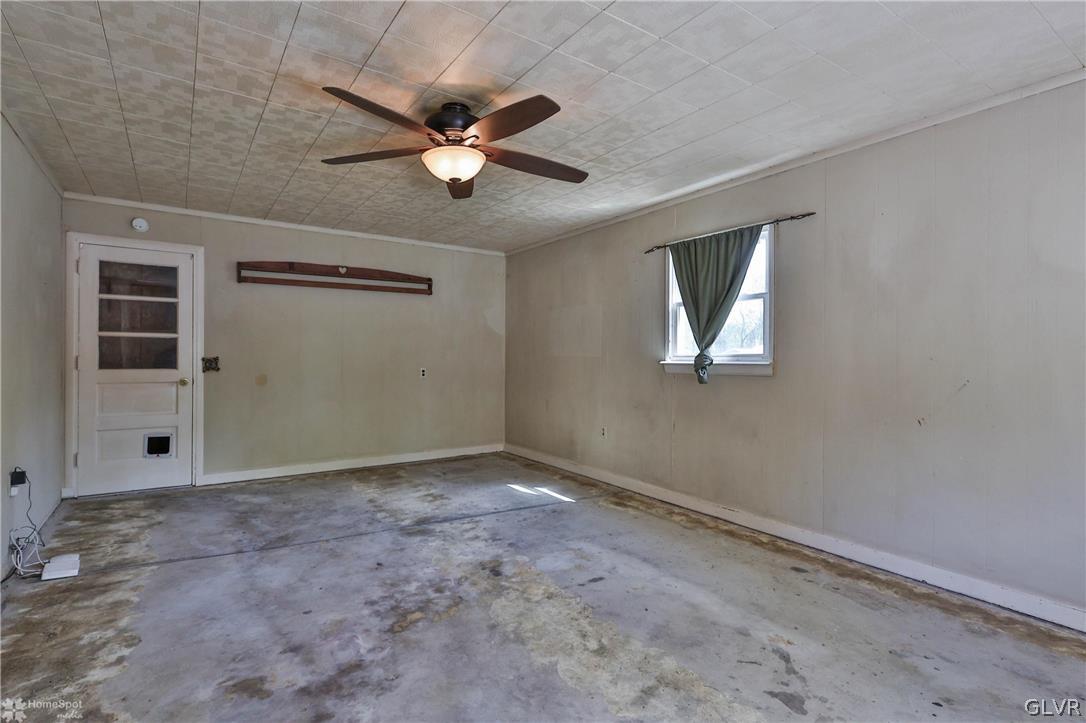 1034 Pine Tree Drive Slatington, PA 18080 - Photo 9 of 46 a view of an empty room with a window