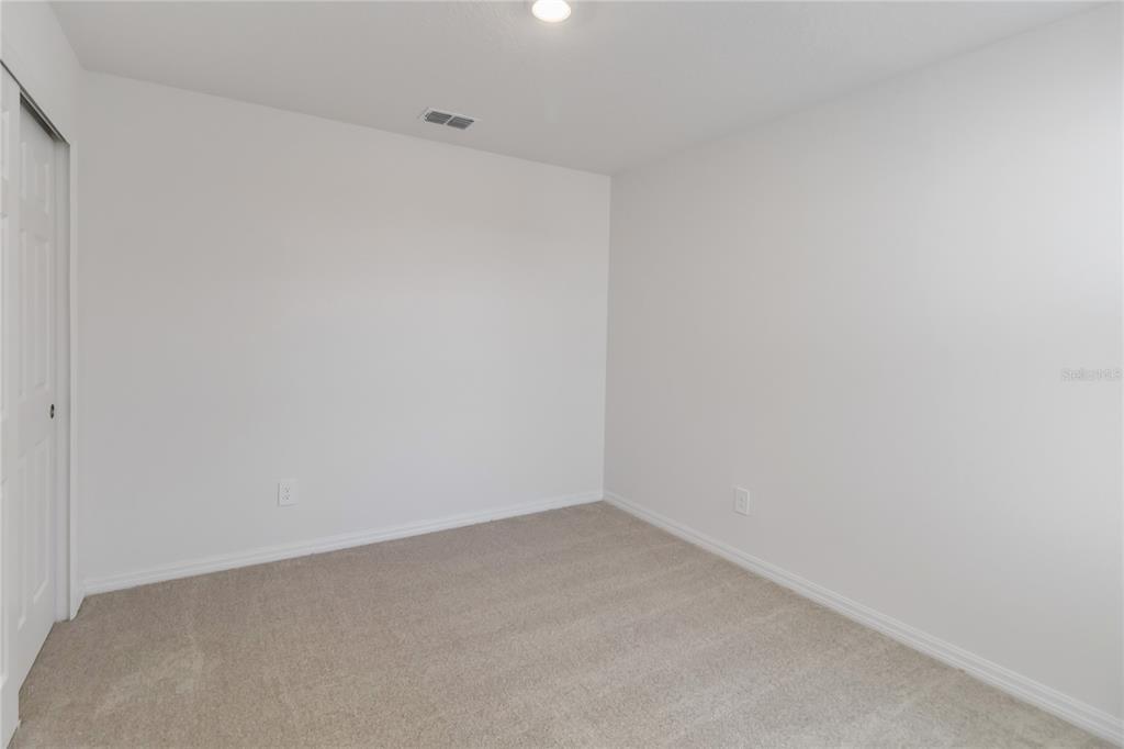 4569 Range Land Way St. Cloud, FL 34772 - Photo 25 of 41 a view of an empty room