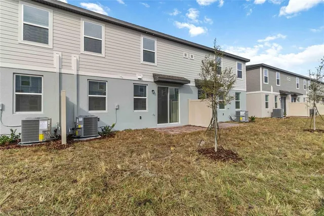 a house with trees in front of it