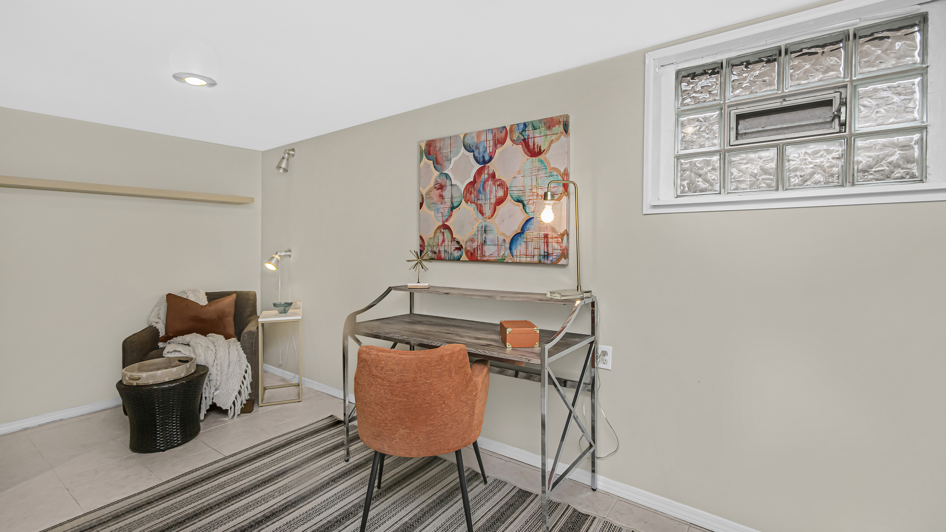 1622 Dempster Street Evanston, IL 60202 - Photo 16 of 21 a room with furniture and a window