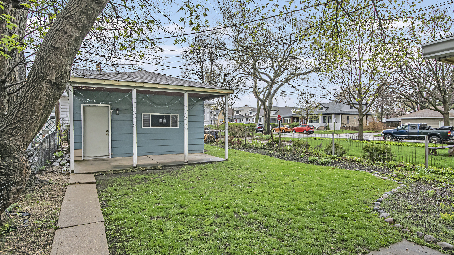 1622 Dempster Street Evanston, IL 60202 - Photo 19 of 21 a view of a house with a yard