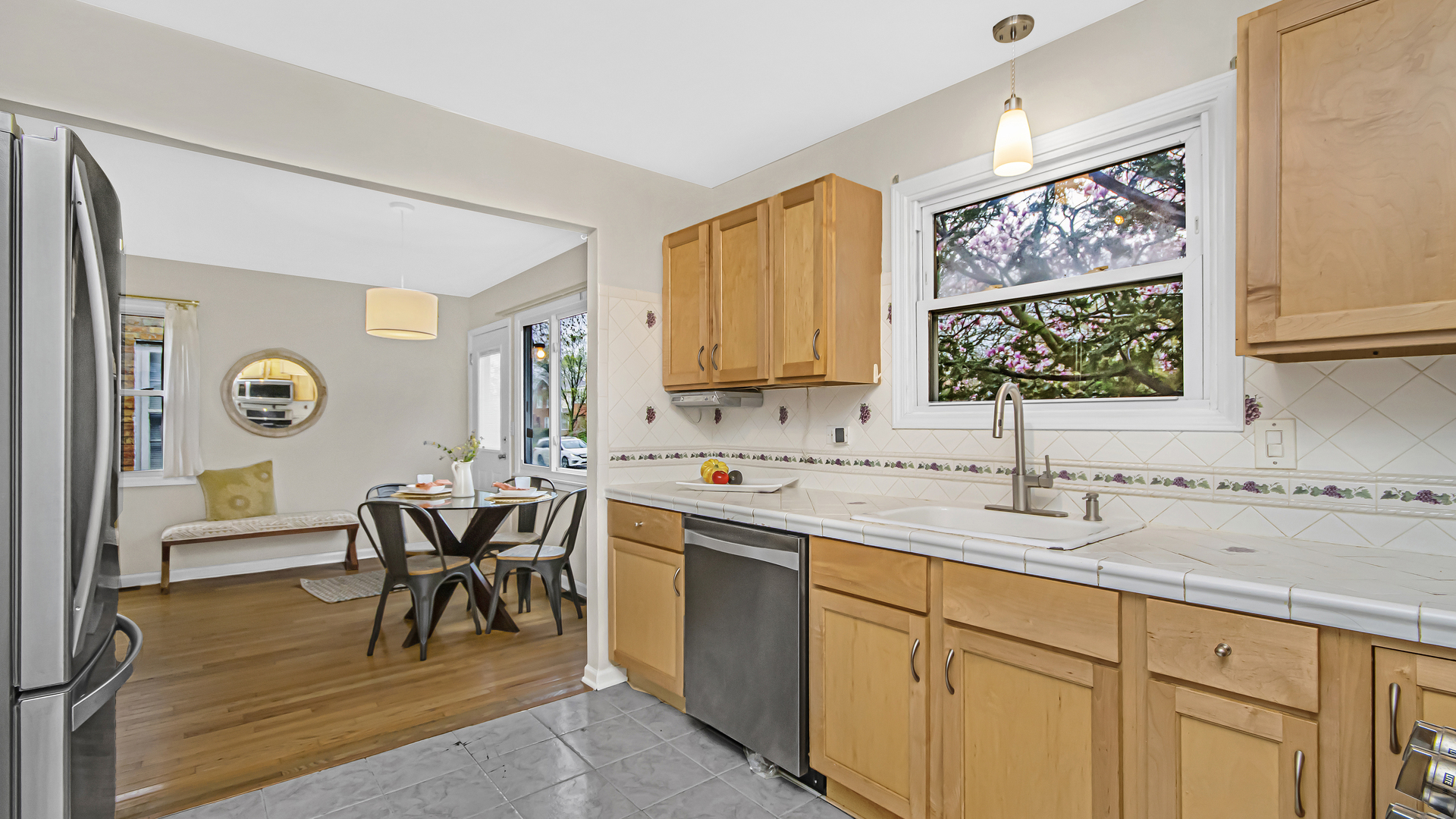 1622 Dempster Street Evanston, IL 60202 - Photo 8 of 21 a kitchen with a sink and a window