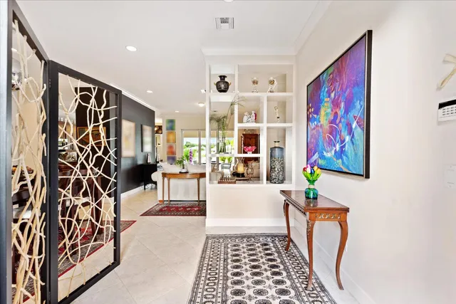 a view of a dining room with furniture wooden floor and a fireplace