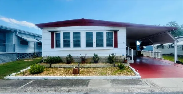 a view of house with outdoor space